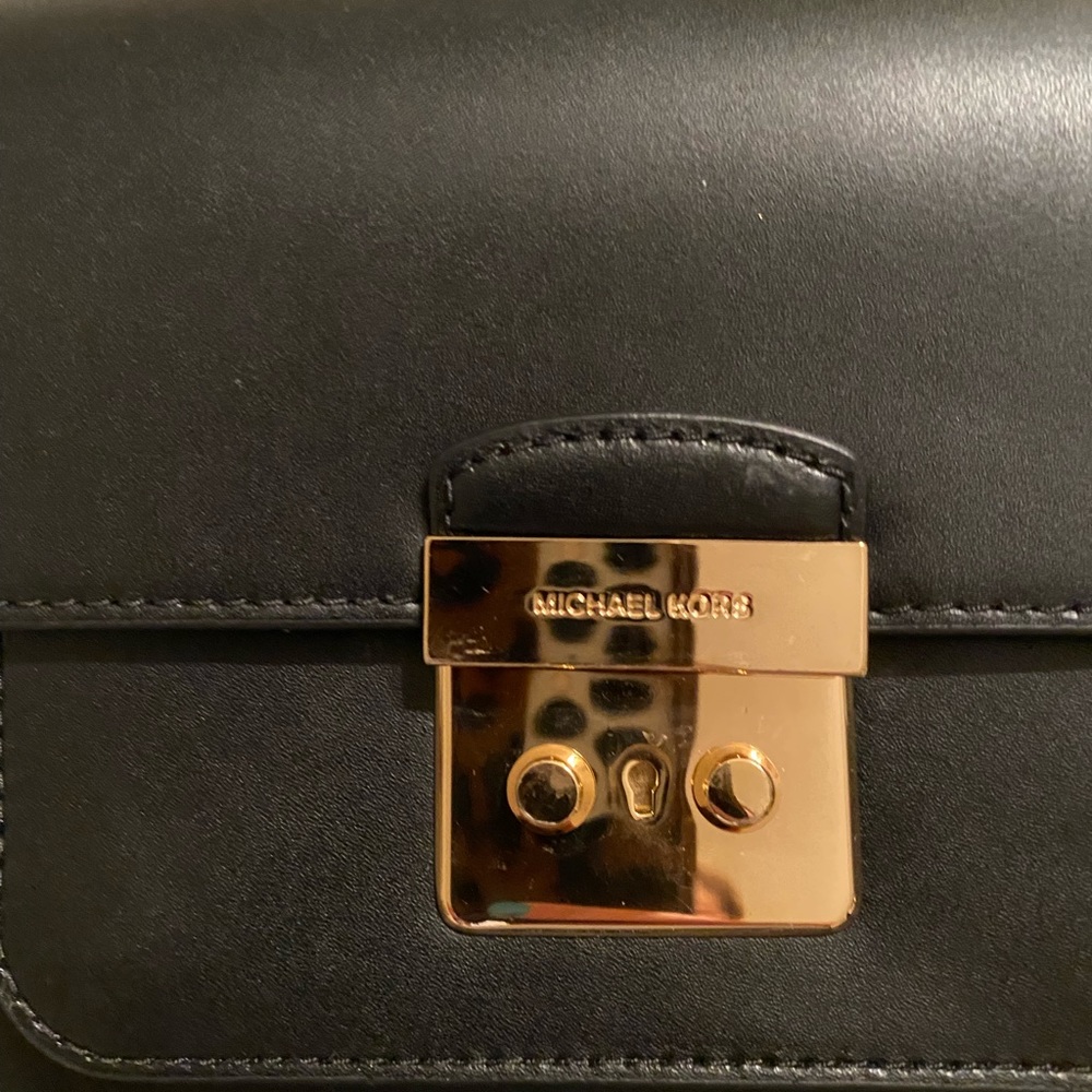 Black Michael Kors purse.